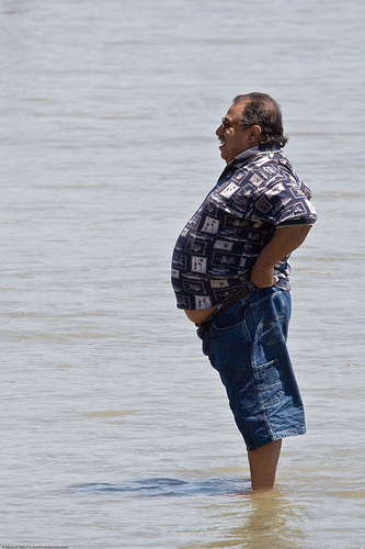 fat man on the beach